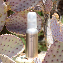 Load image into Gallery viewer, Refreshing Botanical Wash 60ml photographed on a Prickly Pear Cactus. Product is by Mikel Kristi Skincare, based in the Arizona desert. This product is Step 1: Cleanse, and comes in a 60ml aluminum pump bottle with metallic sand colored label.
