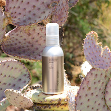 Load image into Gallery viewer, Refreshing Botanical Wash 120ml photographed on a Prickly Pear Cactus. Product is by Mikel Kristi Skincare, based in the Arizona desert. This product is Step 1: Cleanse, and comes in a 120ml aluminum pump bottle with metallic sand colored label.
